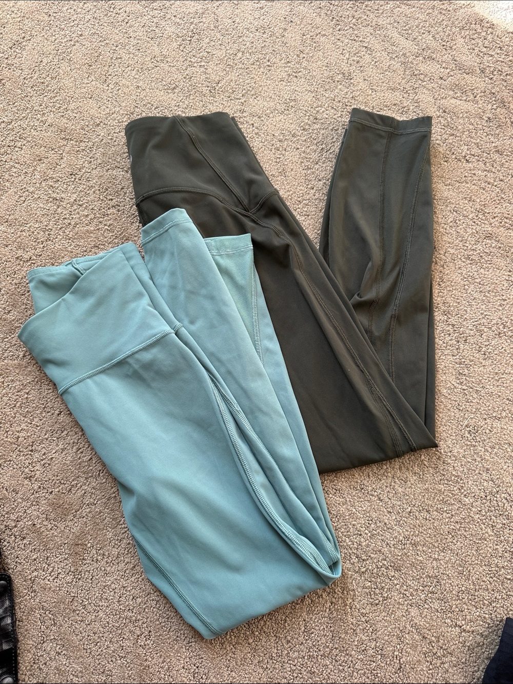 Bundle of lululemon leggings with mesh detail size 4, seafoam and olive green